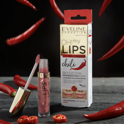Brilho labial Eveline Cosmetics OH! my LIPS chili com embalagem e tubo ao lado de malaguetas vermelhas
