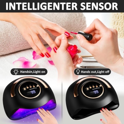 Lâmpada UV preta para unhas com visor digital e mãos a secar verniz vermelho