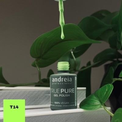 Verniz de gel verde claro com pincel a pingar e folhas verdes ao redor