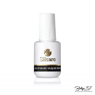 Frasco branco de cola para unhas Silcare com etiqueta preta e texto