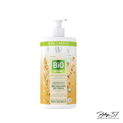 Dispensador branco com rótulo para bálsamo corporal com imagens de espigas e texto em verde e amarelo