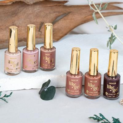 Conjunto de vernizes de unhas em tons neutros com tampas douradas