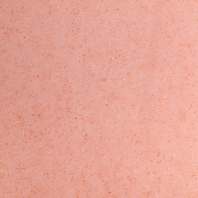 Superfície rosa com textura brilhante e pequenos pontos