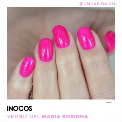 Unhas com verniz gel rosa fluorescente brilhante