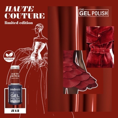 frasco de verniz azul escuro com textos e símbolos sobre fundo vermelho com desenhos de vestidos