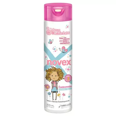 Condicionador Novex Meus Cachinhos embalagem branca com tampa rosa e ilustração de menina.