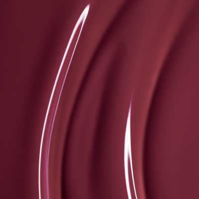 Líquido viscoso castanho avermelhado com brilho e textura suave em fundo da mesma cor