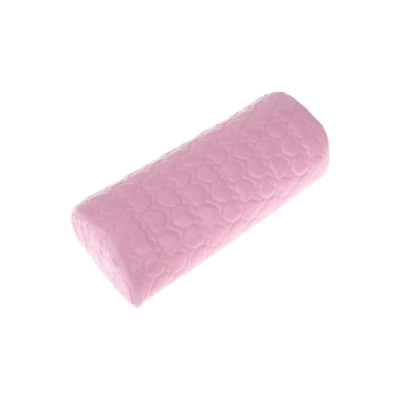 Almofada rosa meia-lua com textura acolchoada em círculos