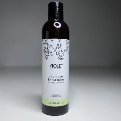 Frasco de shampoo VIOLET com rótulo branco e desenho floral
