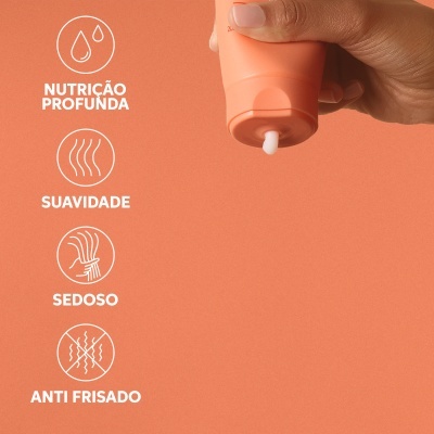 Tubo de creme cor de salmão com creme saindo, texto a branco ao lado com características do produto