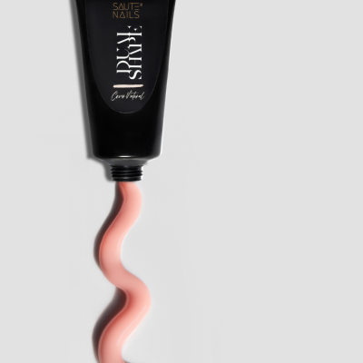 Tubo preto de creme rosa com texto SAUTE NAILS e BULU SHINY