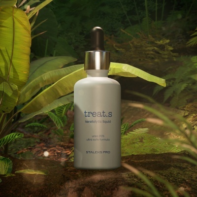 Frasco branco com conta-gotas preto e prateado 'treat.s keratolytic liquid' em ambiente natural