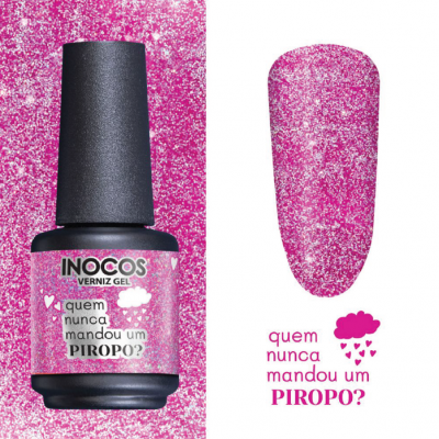 Verniz gel rosa glitter da INOCOS com texto 'quem nunca mandou um PIROPO?' e amostra de cor em unha postiça