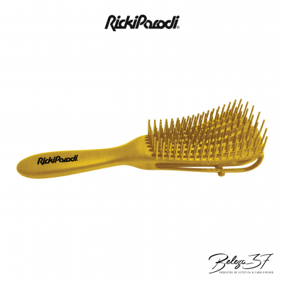 Escova de cabelo amarela com cabo e cerdas plásticas da marca RickiParodi sobre fundo branco