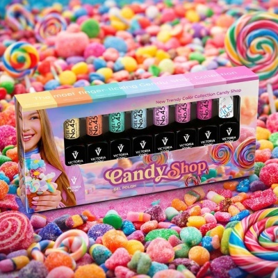 Conjunto de vernizes em gel Victoria Vynn Candy Shop em caixa colorida com doces de fundo