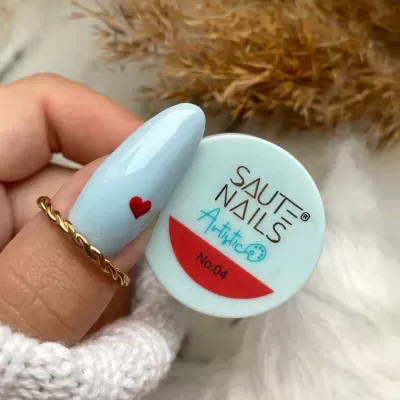Frasco de verniz de unha SAUTE NAILS Artistic No.04 branco com mão e unha azul claro com coração vermelho