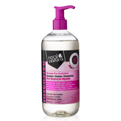 Frasco de champô Real Natura Pro-Cachinhos com tampa rosa e rótulo rosa e preto.