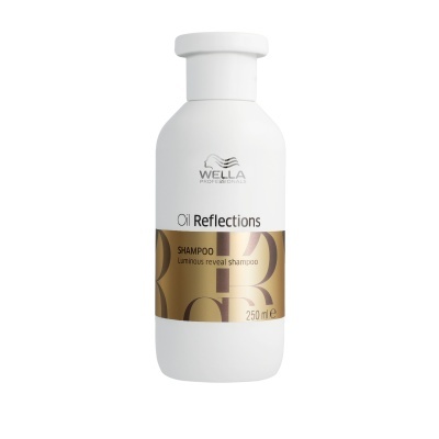 Frasco branco de shampoo WELLA Oil Reflections com rótulo dourado e texto preto e branco