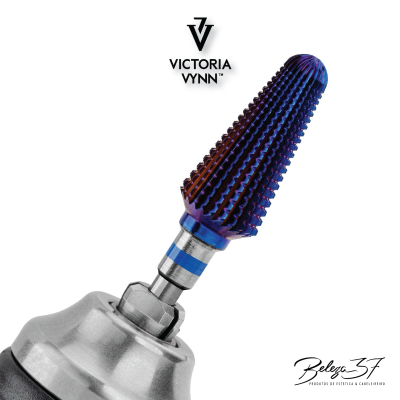 Broca de metal texturizada azul e roxa para unha com ferramenta metálica