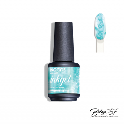 Frasco de verniz em gel azul com rótulo INOCOS Nail Art Inkgel e unha artificial com padrão azul