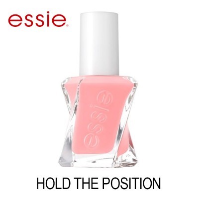 Frasco de verniz de unhas rosa da essie com tampa branca e texto