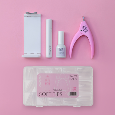 Kit unhas artificiais com aplicador, cola, pinça rosa e unhas falsas em caixa transparente