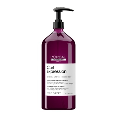 Frasco roxo de champô L'Oréal Curl Expression com tampa de bomba preta