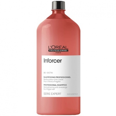 Frasco rosa de shampoo L'Oréal Inforcer 1500 ml com tampa prata e etiqueta branca.