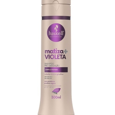 Frasco bege claro de shampoo matizador violeta de 300ml da marca Haskell Cosmetics
