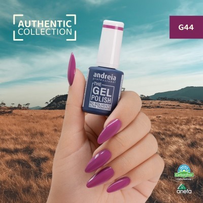 Mão com unhas violeta segurando verniz gel andreia professional