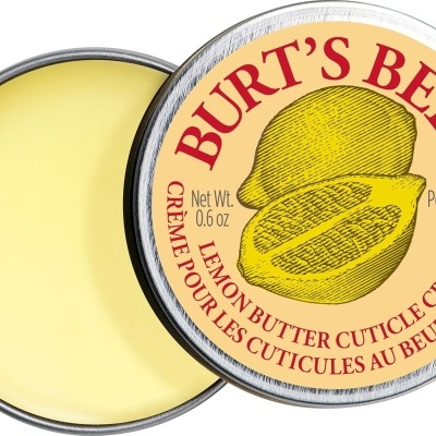 Creme para cutículas em caixa metálica redonda com rótulo BURT'S BEES e desenho de limão