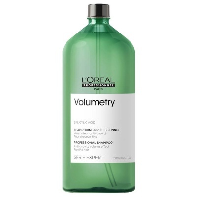 Frasco verde translúcido de champô L'Oréal Professionnel Volumetry