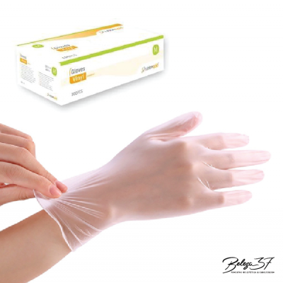 Caixa de luvas vinílicas tamanho M e mão a vestir luva vinílica transparente