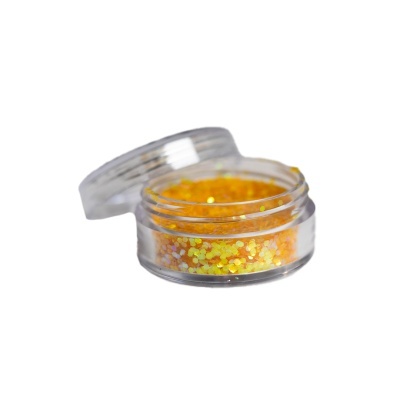 Frasco pequeno transparente com glitter amarelo e dourado brilhante aberto