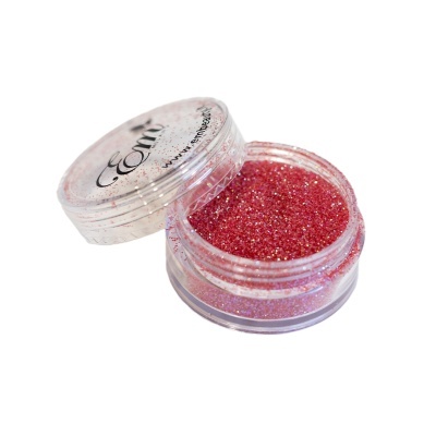 Frasco pequeno de glitter rosa com tampa transparente e inscrições pretas