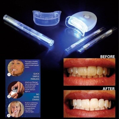 Kit de branqueamento dentário com caneta, molde dental, luz LED, escovas e instruções visíveis