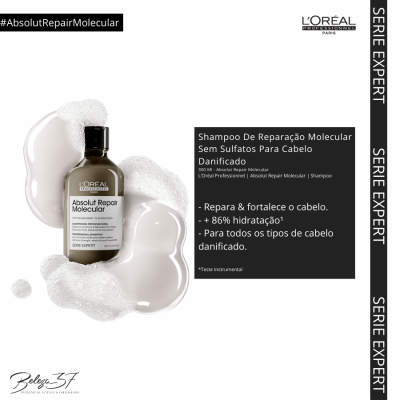 Frasco de shampoo Absolut Repair Molecular L'Oréal com espuma branca ao redor