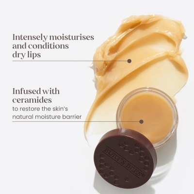 Frasco pequeno de bálsamo beige com tampa castanha BURTS BEES e texto promocional