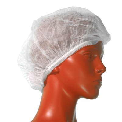 Touca de proteção descartável branca num manequim alaranjado