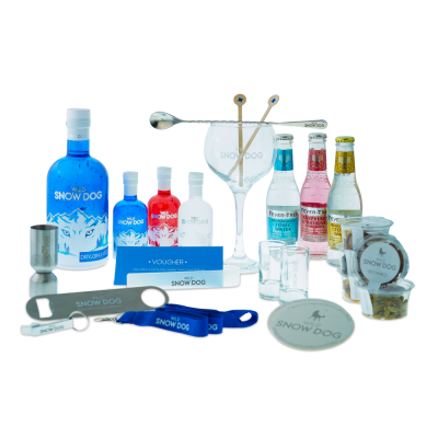 Conjunto de bebidas e acessórios Wild Snow Dog com garrafas de gin, bebidas tónicas, copo de vidro, copos pequenos, abridores e recipientes de botânicos.