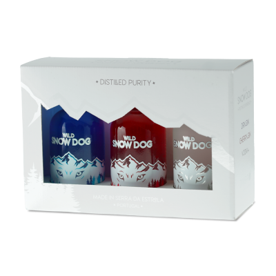 Conjunto de três garrafas Wild Snow Dog em caixa branca com janela transparente.