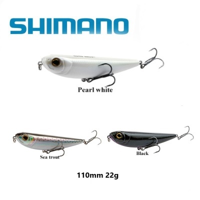 Três iscas artificiais Shimano em branco pérola, padrão sea trout e preto, com 110mm e 22g cada.