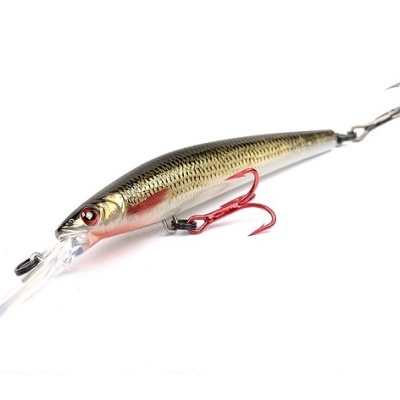 Isca de pesca dourada e preta com anzóis vermelhos e metálicos