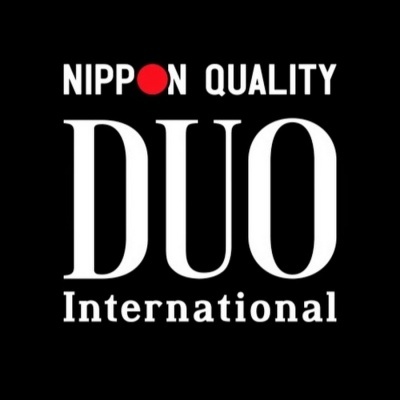 Logotipo com texto NIPPON QUALITY DUO International em fundo preto