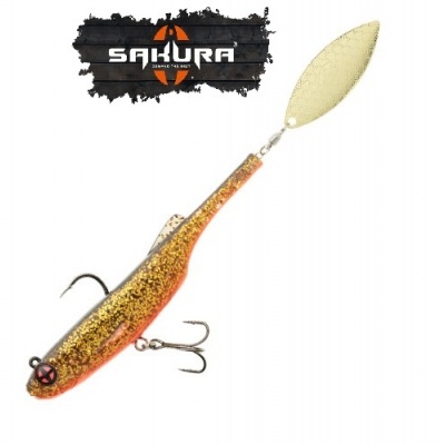 Isca de pesca dourada e laranja com anzóis e pala metálica dourada