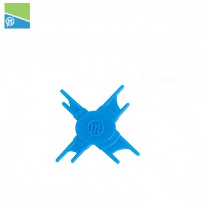 Dispositivo plástico azul com quatro ganchos e símbolo circular central