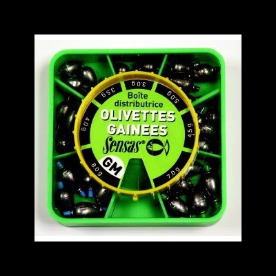 Caixa verde com acessórios metálicos e tampa amarela rotativa com texto 'Boîte distributrice OLIVETTES GAINÉES Sensas'.