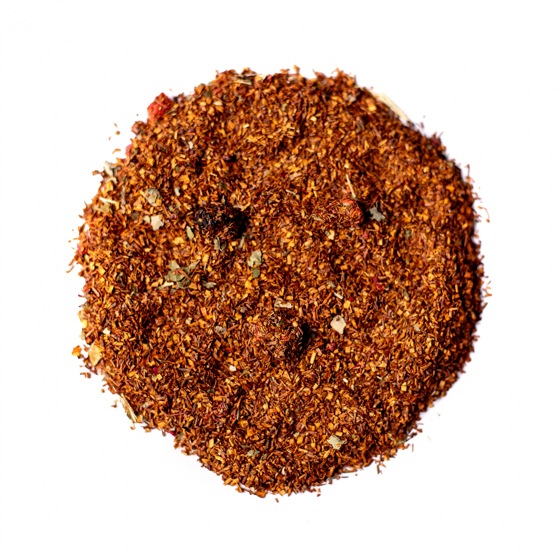 Rooibos Frutas do Bosque Mistura de especiarias em pó com cores castanhas, vermelhas e pontos brancos
