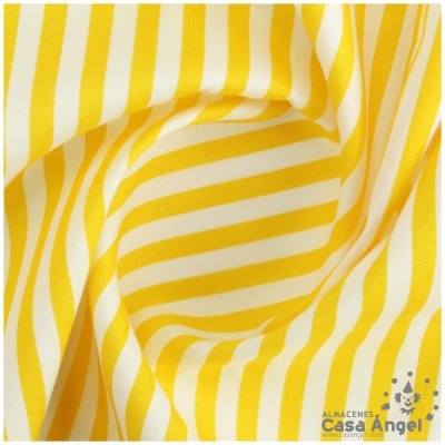 Tecido riscado amarelo e branco dobrado em redemoinho