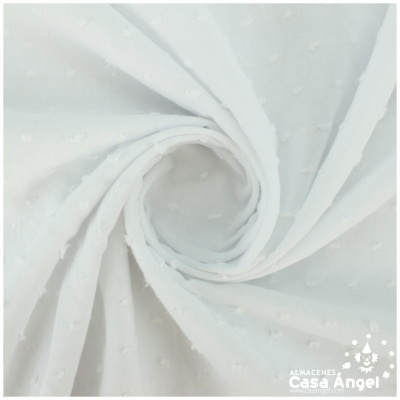 Tecido branco com pontos em relevo em espiral
